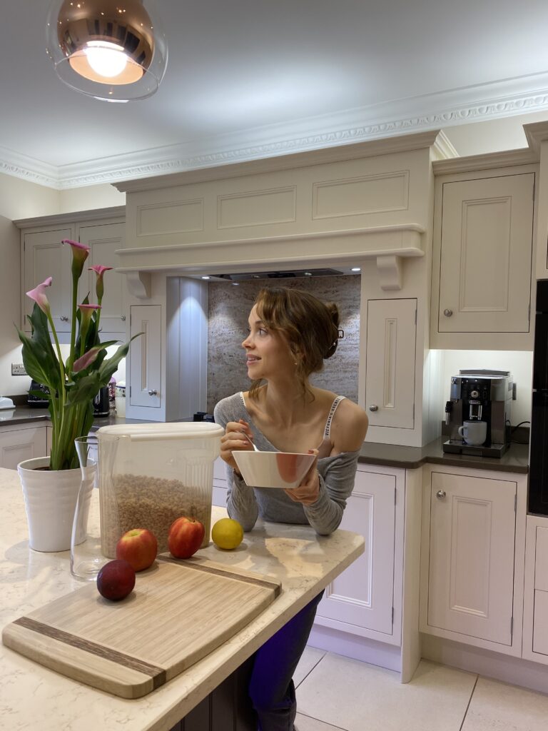 content creator smiling in kitchen